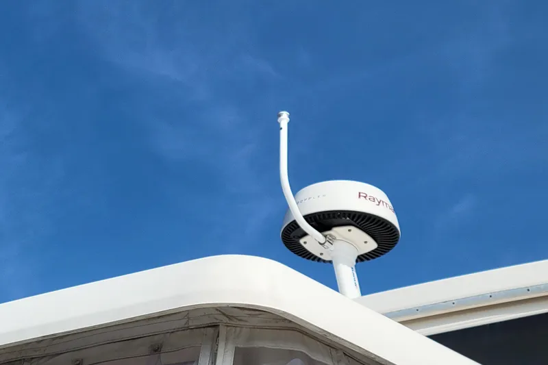 Escape II Sea Yacht Photos Pics Radar equipment on 2003 Silverton 453 Motor Yacht against clear blue sky.