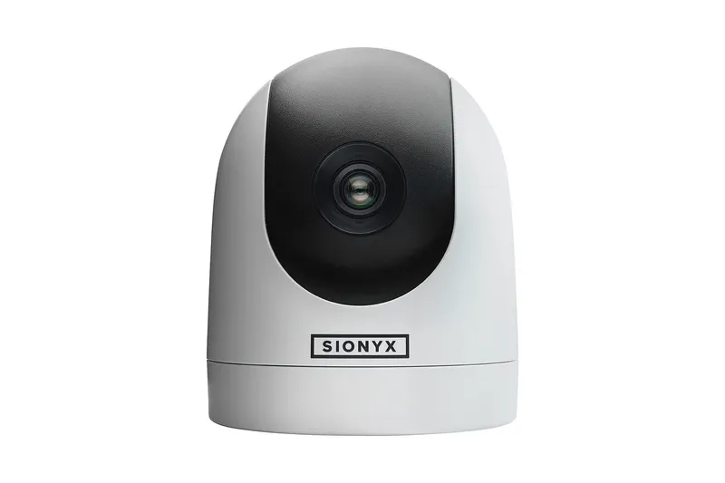 Escape II Sea Yacht Photos Pics A Sionyx night vision camera with a sleek black and white design.