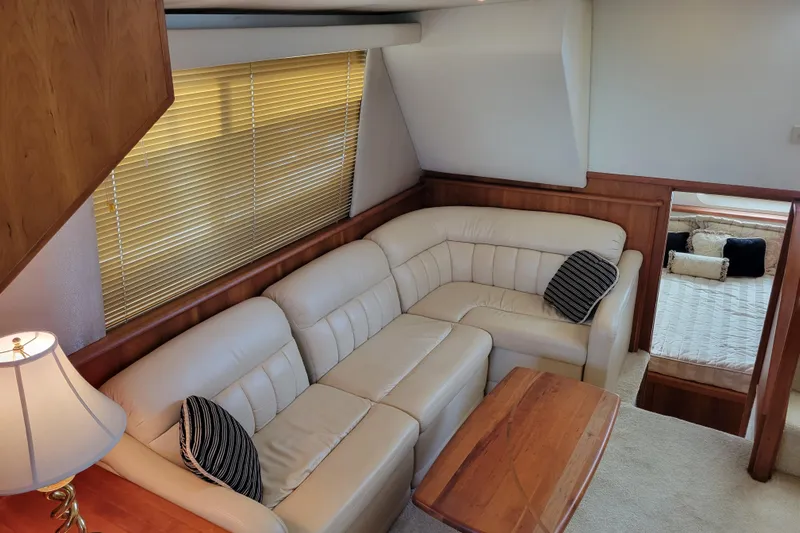 Escape II Sea Yacht Photos Pics Luxurious interior of 2003 Silverton 453 Motor Yacht with leather seating and wooden accents.