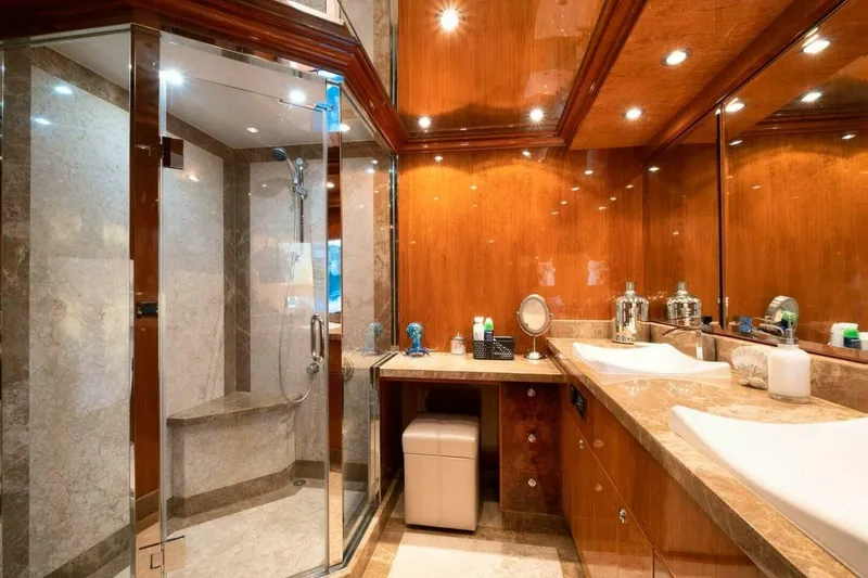 Cynderella Yacht Photos Pics Luxurious bathroom in 2010 Hargrave Custom Raised Pilothouse yacht with marble and wood finishes.