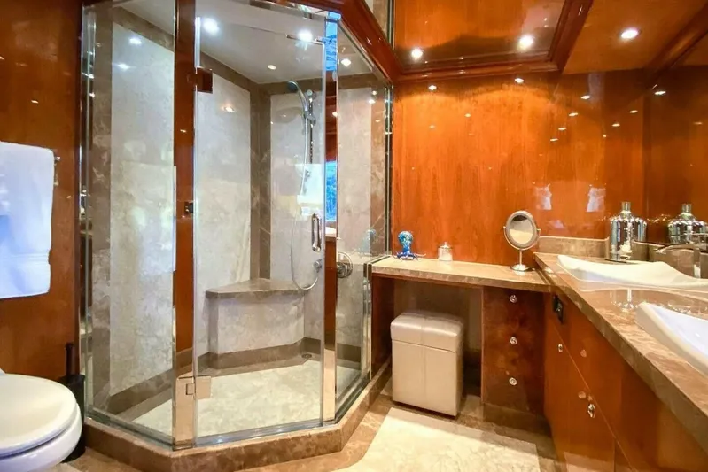 Cynderella Yacht Photos Pics Luxurious bathroom in 2010 Hargrave Custom Raised Pilothouse yacht with glass shower and marble finishes.
