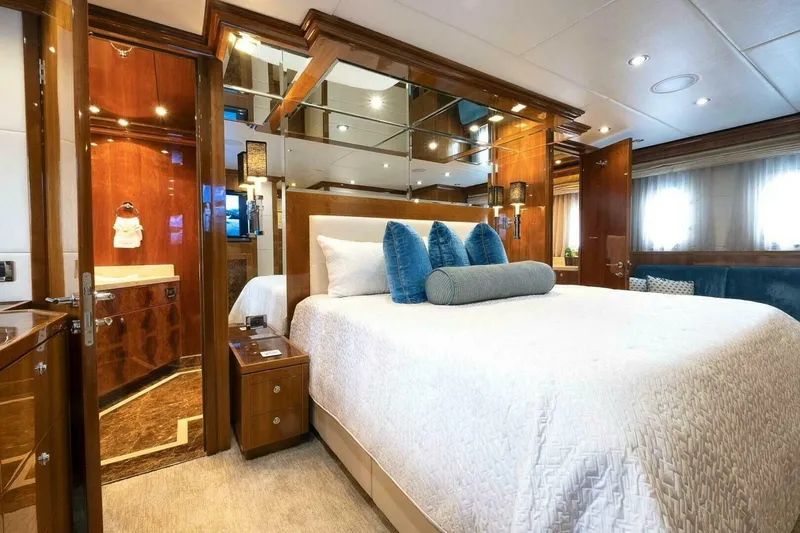 Cynderella Yacht Photos Pics Luxurious bedroom in 2010 Hargrave Custom Raised Pilothouse yacht with elegant wood finishes.