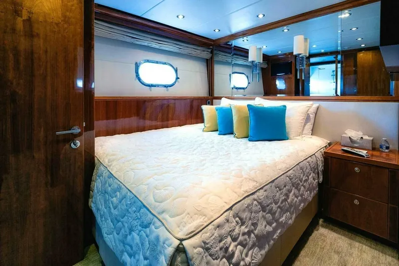 Cynderella Yacht Photos Pics Luxurious bedroom interior of 2010 Hargrave Custom Raised Pilothouse yacht with elegant bedding.