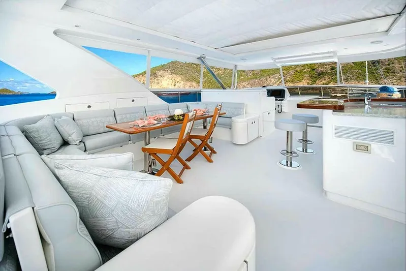 Cynderella Yacht Photos Pics Luxurious 2010 Hargrave Custom Raised Pilothouse yacht interior with elegant seating and dining area.