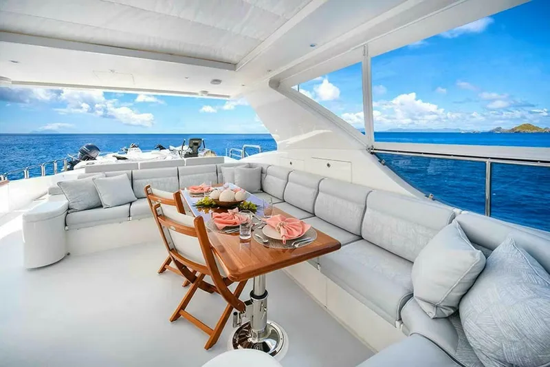 Cynderella Yacht Photos Pics Luxurious 2010 Hargrave Custom Raised Pilothouse yacht with elegant outdoor dining area.