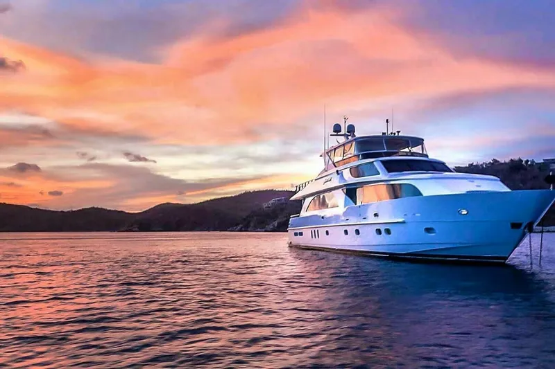Cynderella Yacht Photos Pics Luxurious 2010 Hargrave Custom Raised Pilothouse yacht at sunset on tranquil waters.