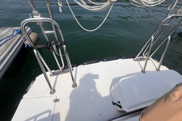 Windless Yacht Photos Pics 2016 Ranger Tugs R-29 S Tug boat deck with railing and water view.