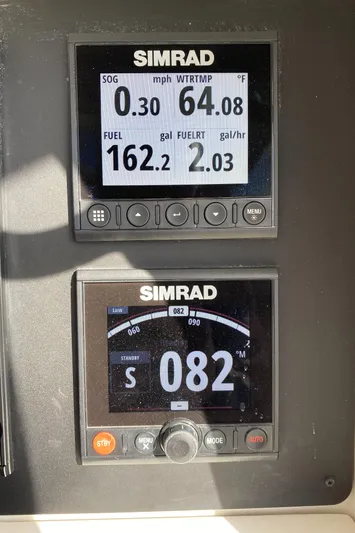 Stoked On Fishing Yacht Photos Pics Simrad marine display on 2008 Everglades 355 Center Console showing speed and fuel data.