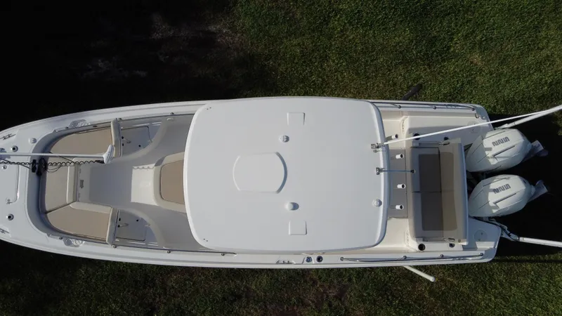  Yacht Photos Pics Aerial view of 2020 Boston Whaler 270 Dauntless boat on grass.