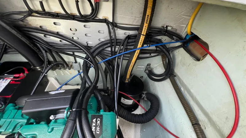 1687 Yacht Photos Pics Engine compartment of a 2006 Leopard 40, showcasing wiring and components.