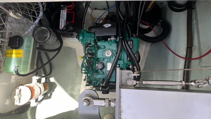 1687 Yacht Photos Pics Engine compartment of a 2006 Leopard 40 catamaran, featuring a well-maintained marine engine.