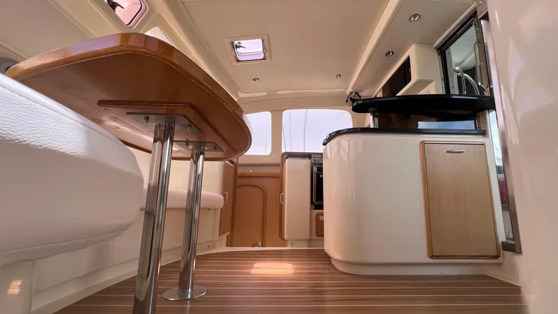 1687 Yacht Photos Pics Interior of 2006 Leopard 40 catamaran with modern design and wooden flooring.