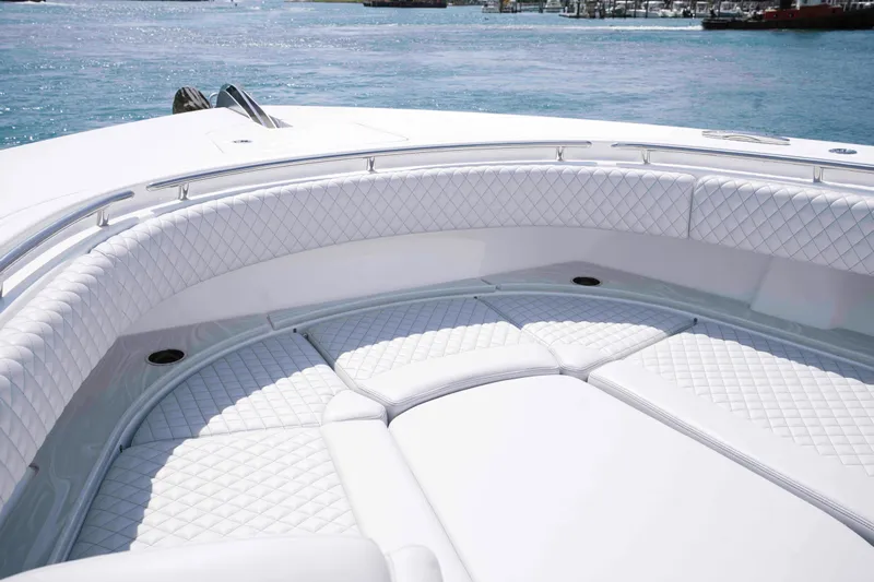 Bushwacked Yacht Photos Pics Luxurious seating on 2025 HCB 56 Suenos GIX yacht with ocean view.