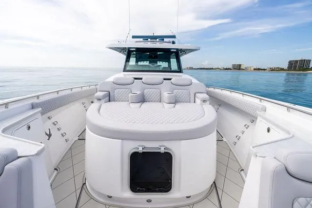 Bushwacked Yacht Photos Pics 2025 HCB 56 Suenos GIX luxury yacht interior with plush seating and ocean view.