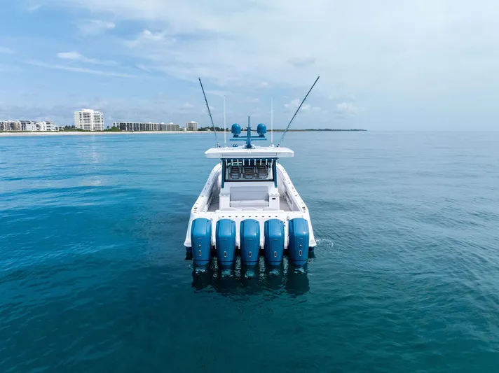 Bushwacked Yacht Photos Pics 2025 HCB 56 Suenos GIX boat with five engines on calm ocean water.
