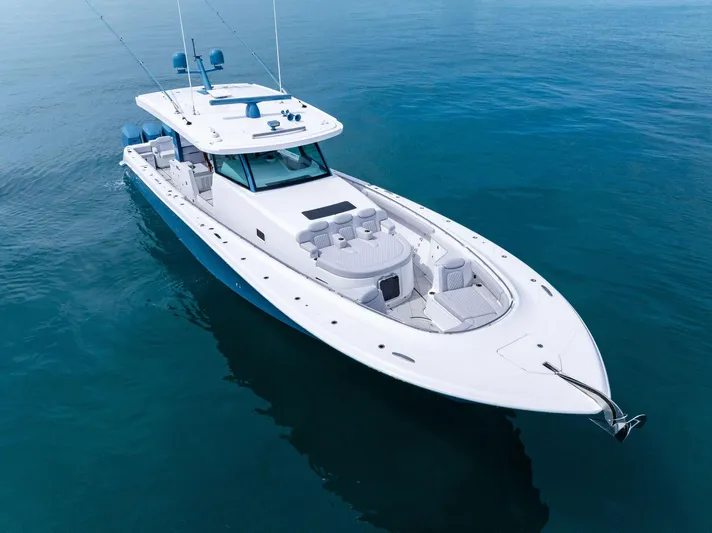 Bushwacked Yacht Photos Pics 2025 HCB 56 Suenos GIX luxury yacht on calm blue water.