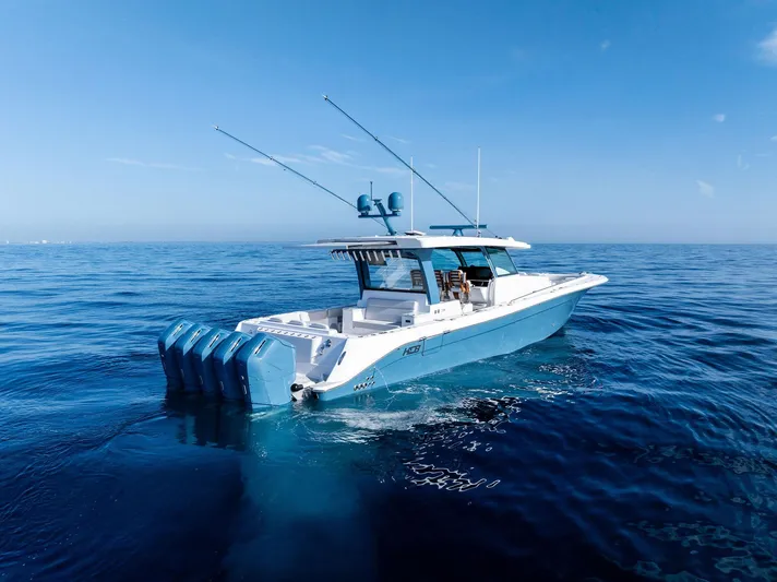 Bushwacked Yacht Photos Pics 2025 HCB 56 Suenos GIX luxury boat cruising on open blue ocean.