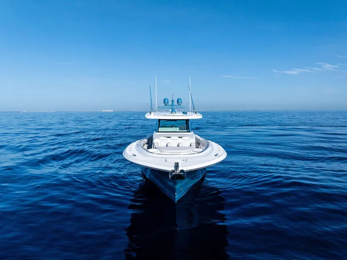 Bushwacked Yacht Photos Pics 2025 HCB 56 Suenos GIX yacht on calm blue ocean waters.