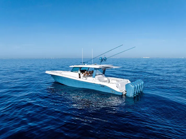 Bushwacked Yacht Photos Pics 2025 HCB 56 Suenos GIX luxury boat on calm blue ocean.