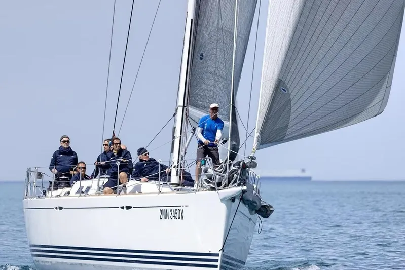 Arya Yacht Photos Pics Sailing on a 2010 X Yachts X-50 with crew, open sea background.