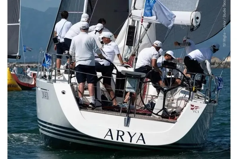 Arya Yacht Photos Pics Sailing crew on 2010 X Yachts X-50 boat named ARYA during a race.