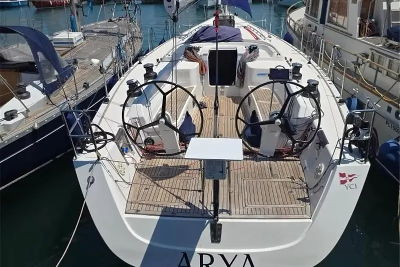 Arya Yacht Photos Pics 2010 X Yachts X-50 sailboat docked at marina, featuring dual steering wheels.