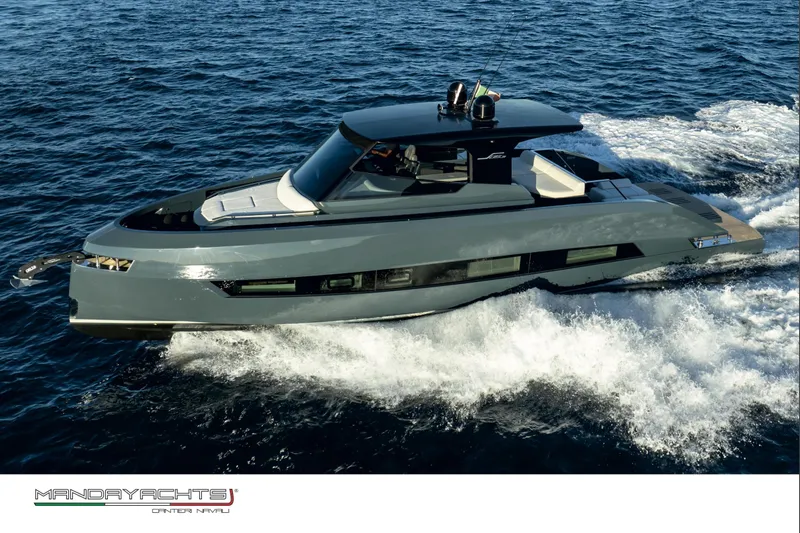  Yacht Photos Pics 2025 MandaYachts S05 cruising on open water, showcasing sleek design and modern features.