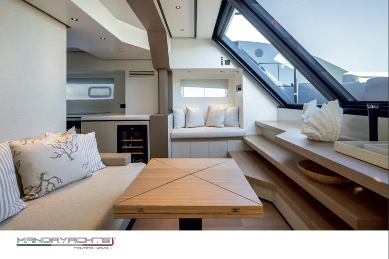  Yacht Photos Pics Luxurious interior of 2025 MandaYachts S05, featuring elegant seating and modern design elements.
