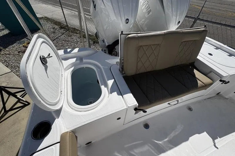  Yacht Photos Pics 2026 Blazer Bay Makaira 2800 boat interior with seating and storage compartments.