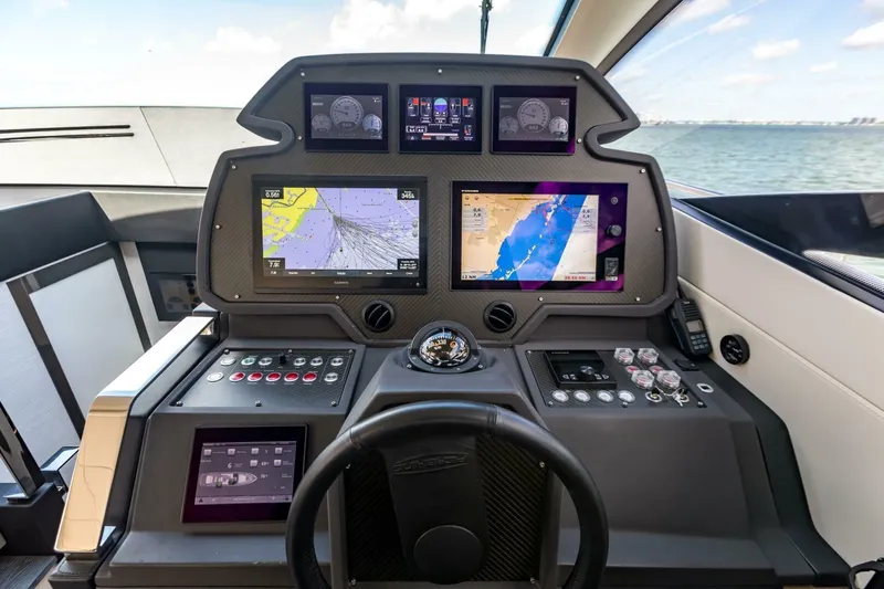 Pershing 70 White Yacht Photos Pics Cockpit of 2016 Pershing 70 yacht with advanced navigation and control systems.