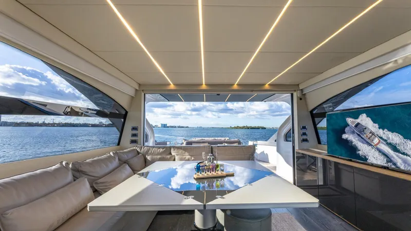 Pershing 70 White Yacht Photos Pics Luxurious interior of a 2016 Pershing 70 yacht with panoramic ocean views.