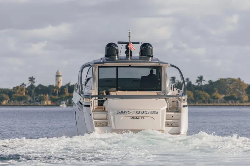 Pershing 70 White Yacht Photos Pics 2016 Pershing 70 yacht cruising near Miami lighthouse, rear view.