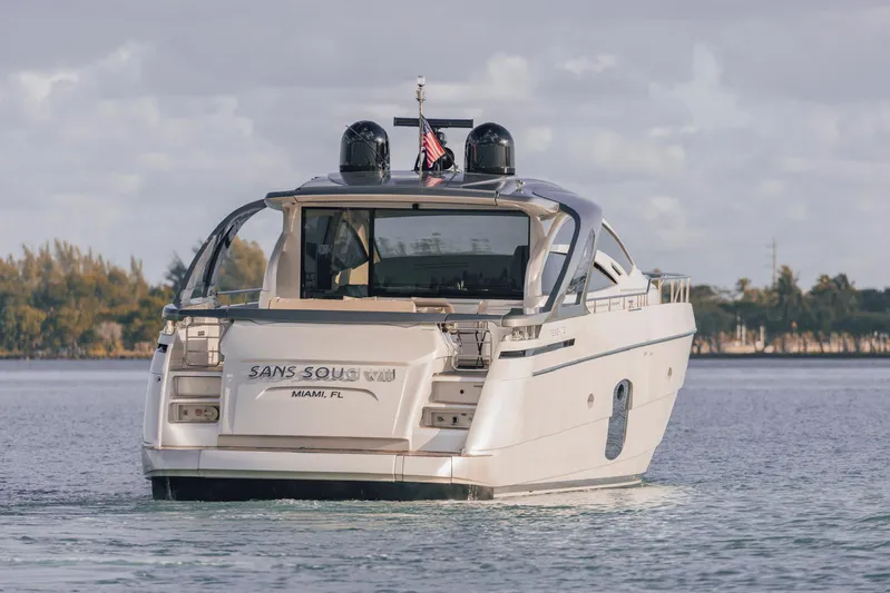 Pershing 70 White Yacht Photos Pics 2016 Pershing 70 yacht cruising in calm waters near Miami, Florida.