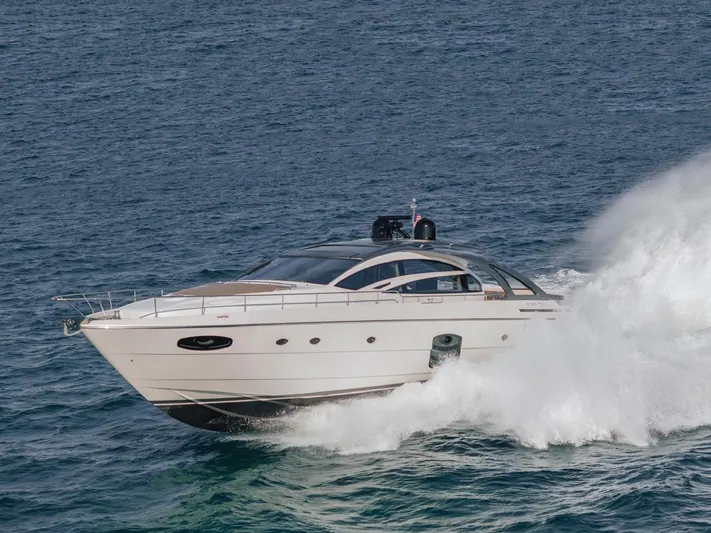 Pershing 70 White Yacht Photos Pics 2016 Pershing 70 yacht cruising swiftly on open sea.