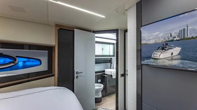 Pershing 70 White Yacht Photos Pics Luxurious interior of 2016 Pershing 70 yacht with modern bathroom and stylish decor.