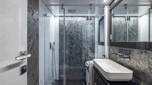 Pershing 70 White Yacht Photos Pics Luxurious bathroom in 2016 Pershing 70 yacht with modern shower and sleek design.