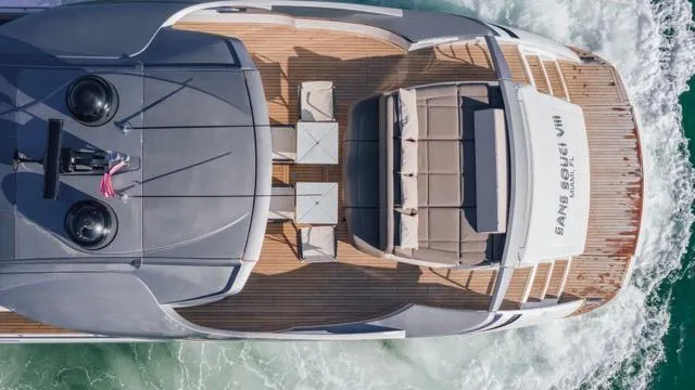 Pershing 70 White Yacht Photos Pics Aerial view of 2016 Pershing 70 yacht cruising on the ocean.