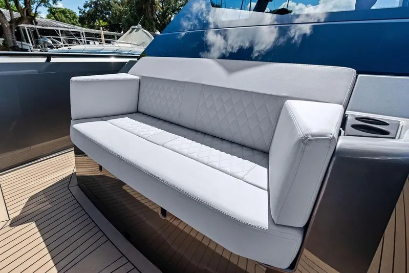 Not His Yacht Photos Pics Luxurious seating on 2024 Vanquish Yachts 40, featuring elegant design and premium materials.