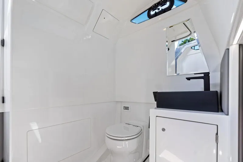 Not His Yacht Photos Pics Luxurious bathroom interior of 2024 Vanquish Yachts 40, featuring modern fixtures and sleek design.