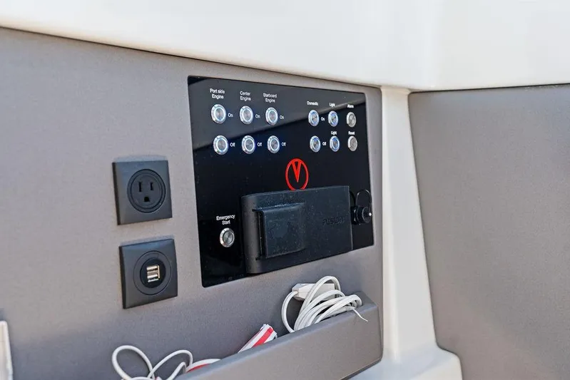Not His Yacht Photos Pics Control panel of 2024 Vanquish Yachts 40 with switches and outlets.
