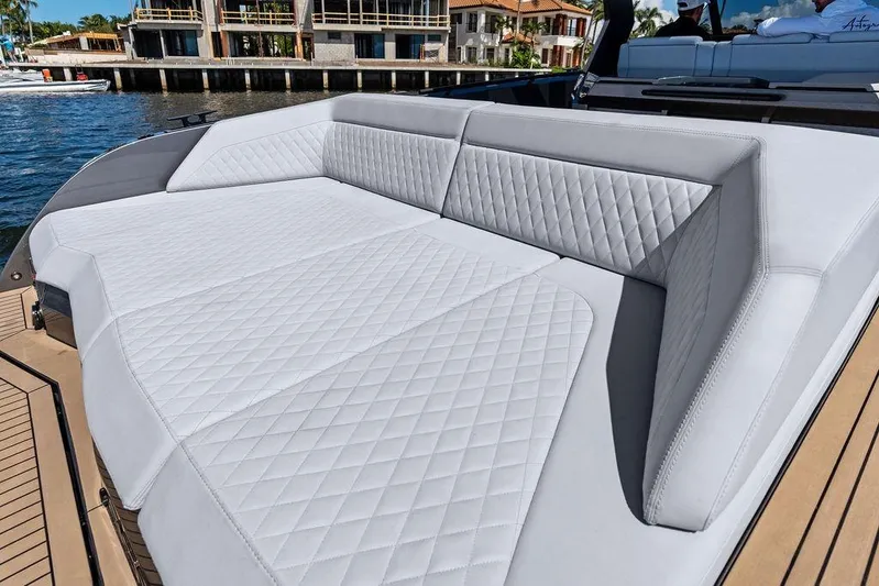 Not His Yacht Photos Pics Luxurious seating on 2024 Vanquish Yachts 40, featuring elegant diamond-pattern upholstery.