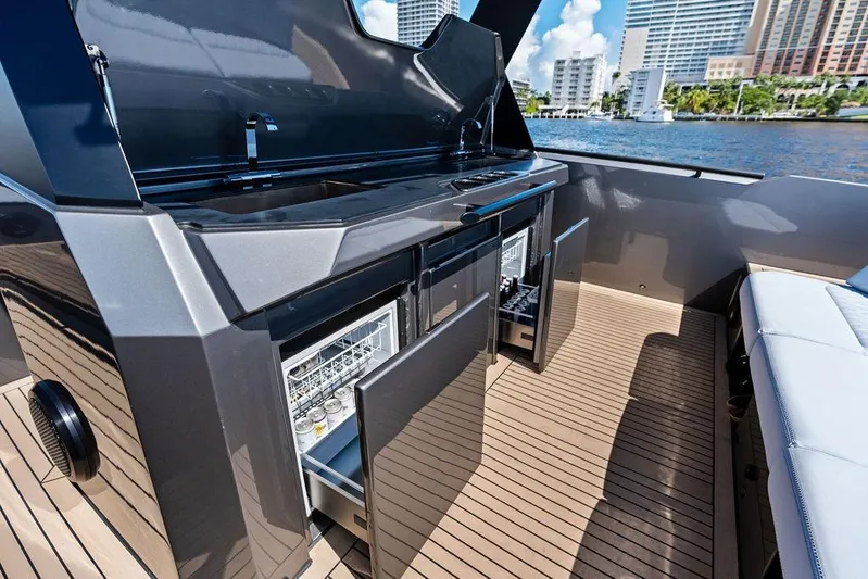 Not His Yacht Photos Pics 2024 Vanquish Yachts 40 interior with open cabinets and modern amenities.