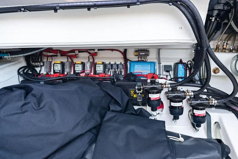 Not His Yacht Photos Pics Engine compartment of 2024 Vanquish Yachts 40, showcasing wiring and components.