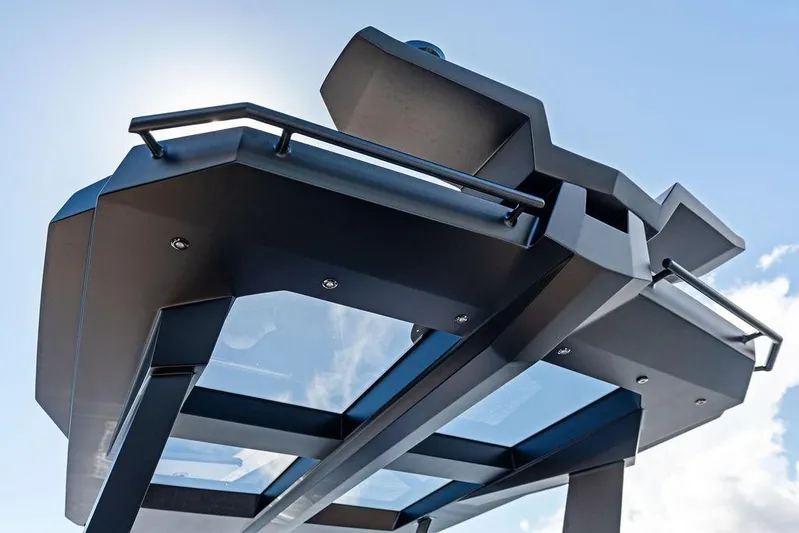 Not His Yacht Photos Pics 2024 Vanquish Yachts 40, sleek design detail against a clear blue sky.