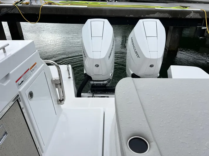 Yacht Photos Pics 2025 Beneteau Gran Turismo 36 with twin Mercury outboard engines at dock.