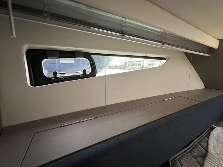  Yacht Photos Pics Interior view of 2025 Beneteau Gran Turismo 36 yacht window and seating area.