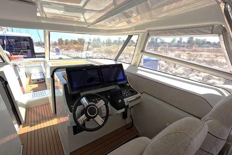  Yacht Photos Pics Interior view of 2025 Catana YOT 41 yacht cockpit with modern steering and navigation systems.