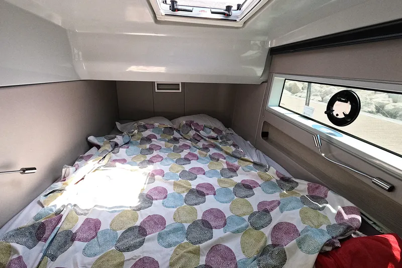  Yacht Photos Pics Cozy cabin interior of 2025 Catana YOT 41 with colorful bedding and natural light.