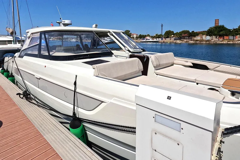  Yacht Photos Pics 2025 Catana YOT 41 yacht docked at marina under clear blue sky.