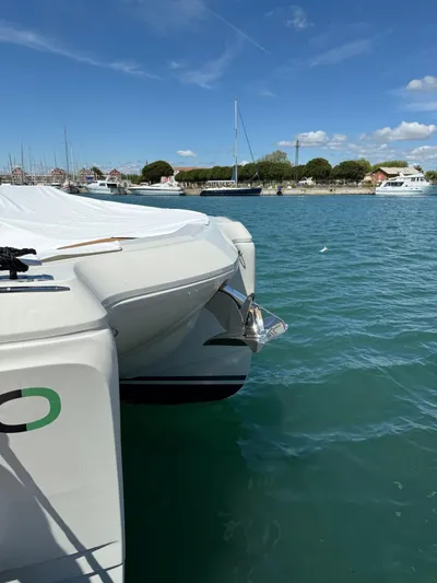  Yacht Photos Pics Modern YOT 41 boat docked in a serene marina, 2025 model.